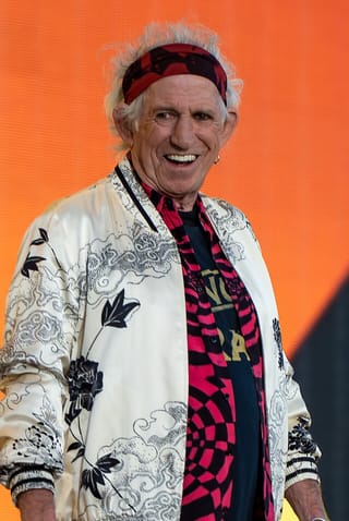 Keith Richards playing guitar at Hyde Park, London, in 2022
